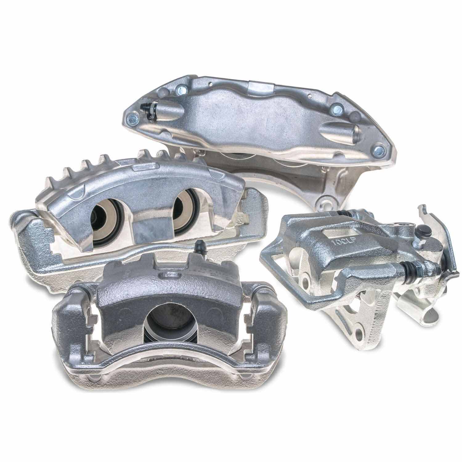 Four silver brake calipers.