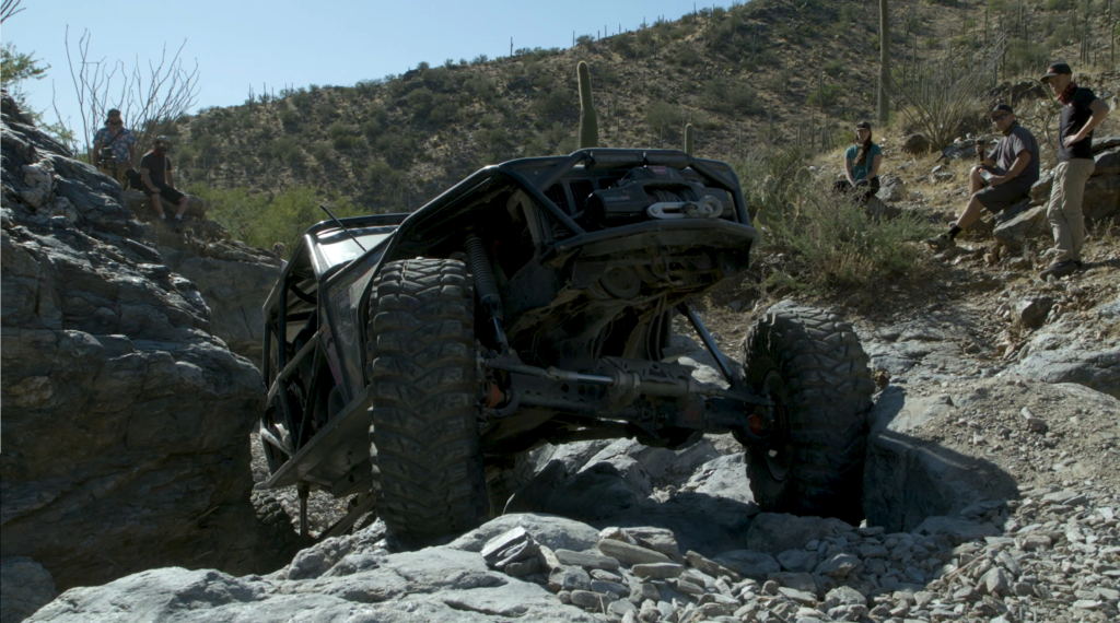 Matt bleepinjeep crawling over waterfall at Highway to hell episode 1 trail to sema arizona